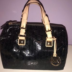 Michael Kors Grayson Speedy Boston Bag in black patent leather.